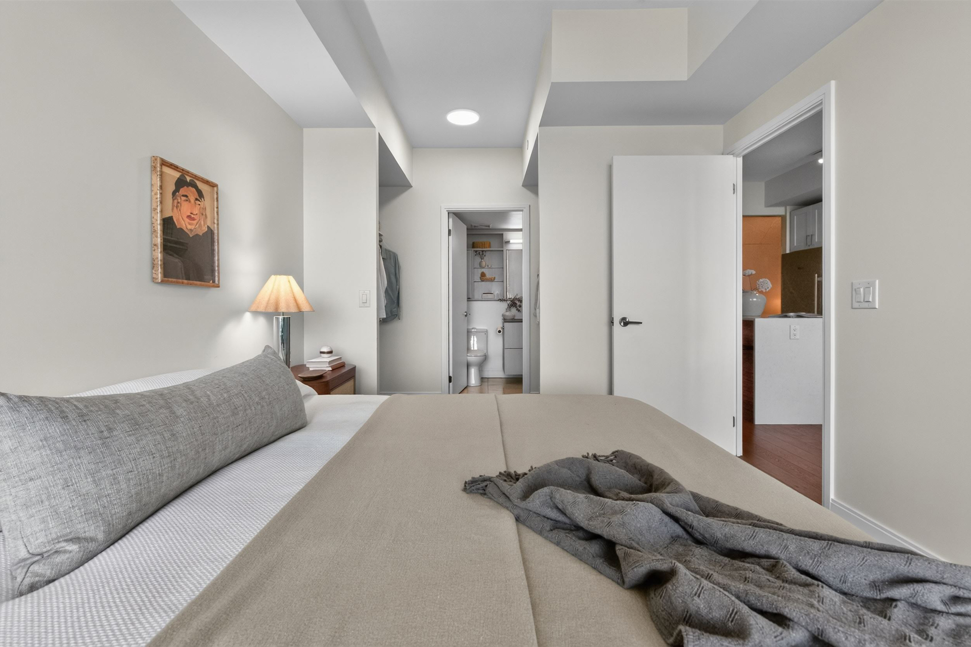 Primary bedroom with ensuite and walk-through closet access